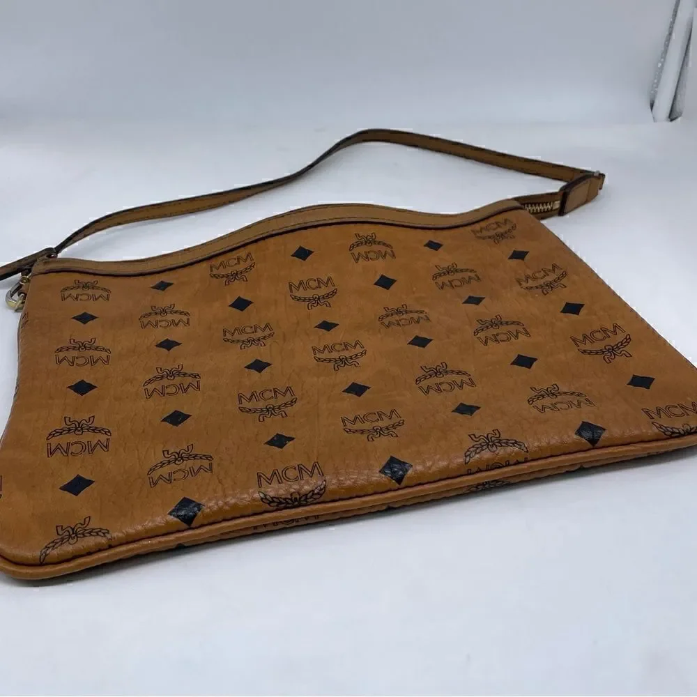 MCM authentic Cognac visetos zip Pouch entrupy COA